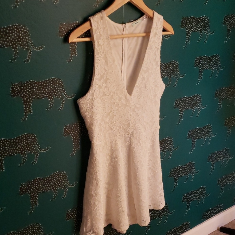 White lace romper from Urban Outfitters